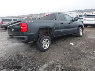 2018 Chevrolet Silverado 1500 LT with VIN 1GCVKREC9JZ200573, listed as a IAAI auction lot 41656239 with 74,000 mi miles. Bid and sale history available at carsss.com. Image 4.