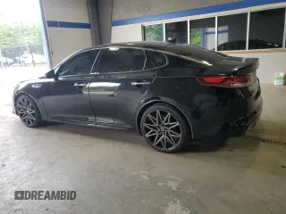 2016 Kia Optima SX Turbo with VIN 5XXGW4L23GG011780, listed as a Copart auction lot 56628295 with 104,288 mi miles and Salvage title. Bid and sale history available at DreamBid. Image 2.
