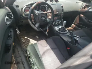 2009 Nissan 370Z Touring with VIN JN1AZ44E49M402605, listed as a Copart auction lot 55972355 with 157,066 mi miles and Clean Title. Bid and sale history available at DreamBid. Image 8.