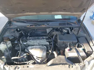 2004 Toyota Camry LE with VIN 4T1BE32KX4U916477, listed as a IAAI auction lot 42018299 with 149,247 mi miles. Bid and sale history available at carsss.com. Image 10.