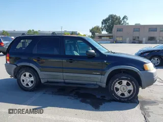 2002 Ford Escape XLT with VIN 1FMCU03142KC39723, listed as a IAAI auction lot 42228038 with 131,399 mi miles and . Bid and sale history available at DreamBid. Image 14.