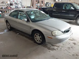 2003 Mercury Sable LS Premium with VIN 1MEFM55S63G621064, listed as a IAAI auction lot 42099656 with 182,862 mi miles. Bid and sale history available at carsss.com. Image 1.
