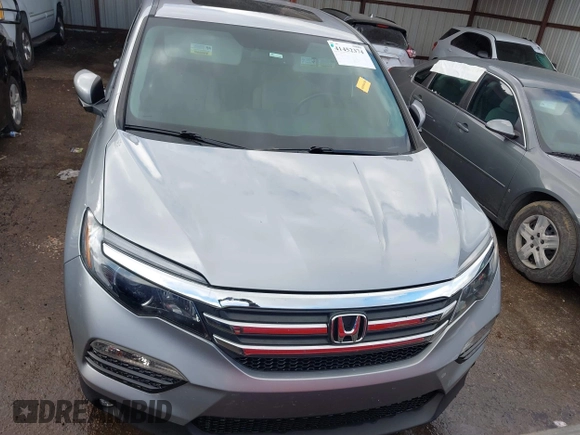 2016 Honda Pilot EX-L with VIN 5FNYF5H53GB040003, listed as a IAAI auction lot 41452374 with Not Provided miles and . Bid and sale history available at DreamBid. Image 11.