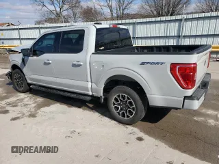 2023 Ford F-150 XL with VIN 1FTEW1CP4PKD26319, listed as a Copart auction lot 43797415 with 25,895 mi miles and Salvage Title. Bid and sale history available at DreamBid. Image 2.