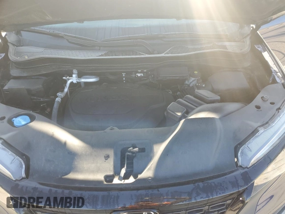 2021 Honda Passport EX-L with VIN 5FNYF8H57MB027798, listed as a Copart auction lot 54586735 with 28,658 mi miles and Salvage Title. Bid and sale history available at DreamBid. Image 12.