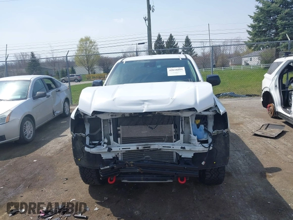 2021 GMC Canyon 4WD AT4 z VIN 1GTG6FENXM1291689, wystawiony jako IAAI lot #42038884 z przebiegiem 54 884 mil mil oraz . Historia ofert i sprzedaży dostępna na DreamBid. Obrazek 12.