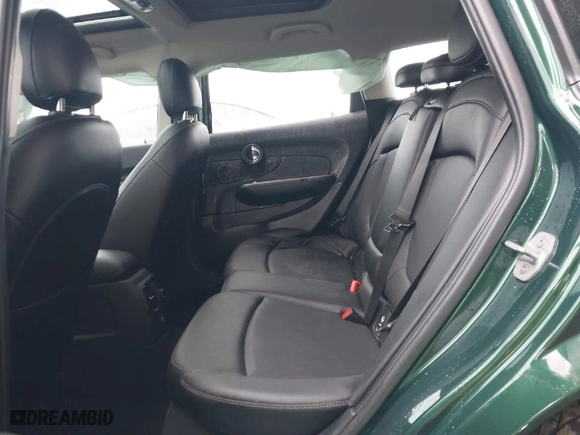 2016 MINI Cooper Clubman with VIN WMWLN5C55G2E07099, listed as a IAAI auction lot 41507429 with 53,271 mi miles. Bid and sale history available at carsss.com. Image 8.