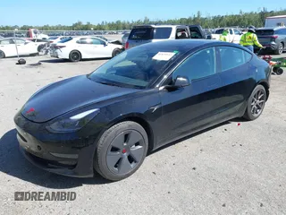 2023 Tesla Model 3 with VIN 5YJ3E1EAXPF623403, listed as a IAAI auction lot 41829543 with 29,414 mi miles and . Bid and sale history available at carsss.com. Image 18.