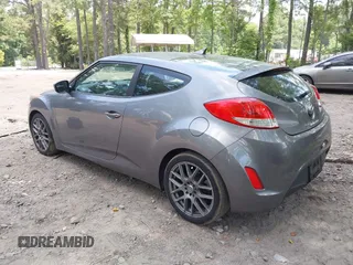 2012 Hyundai Veloster w/Black Int with VIN KMHTC6AD3CU078547, listed as a IAAI auction lot 42633915 with 143,633 mi miles and . Bid and sale history available at DreamBid. Image 3.