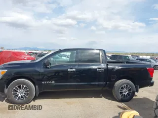 2021 Nissan Titan SL z VIN 1N6AA1ED9MN509741, wystawiony jako IAAI lot #42062139 z przebiegiem 41 291 mil mil oraz . Historia ofert i sprzedaży dostępna na DreamBid. Obrazek 14.