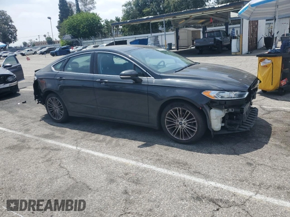 2013 Ford Fusion SE z VIN 3FA6P0H97DR215735, wystawiony jako Copart lot #62326335 z przebiegiem 100 312 mil mil oraz Szkoda całkowita • Salvage title. Historia ofert i sprzedaży dostępna na DreamBid. Obrazek 4.