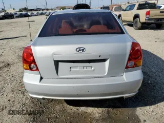 2004 Hyundai Accent GL with VIN KMHCG45C74U550647, listed as a Copart auction lot 74526474 with 115,838 mi miles and Salvage Title. Bid and sale history available at carsss.com. Image 6.