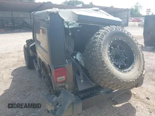 2014 Jeep Wrangler Sport with VIN 1C4AJWAGXEL233647, listed as a IAAI auction lot 39993785 with Not Provided miles and . Bid and sale history available at DreamBid. Image 19.