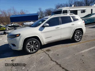 2019 Jeep Cherokee Overland with VIN 1C4PJMJN3KD173830, listed as a Copart auction lot 87229794 with 82,433 mi miles and Salvage title. Bid and sale history available at DreamBid. Image 1.