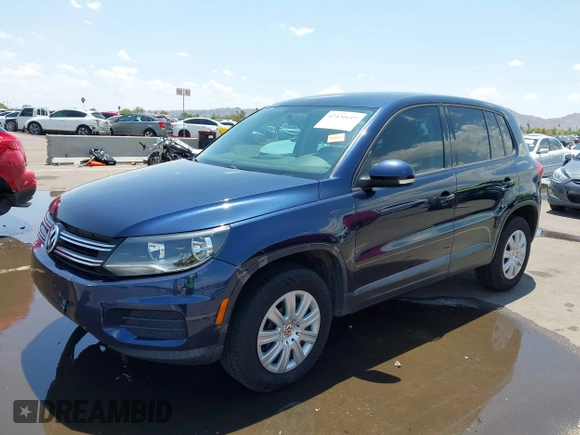 2013 Volkswagen Tiguan with VIN WVGCV3AX6DW605876, listed as a IAAI auction lot 42431619 with 106,279 mi miles and . Bid and sale history available at DreamBid. Image 17.