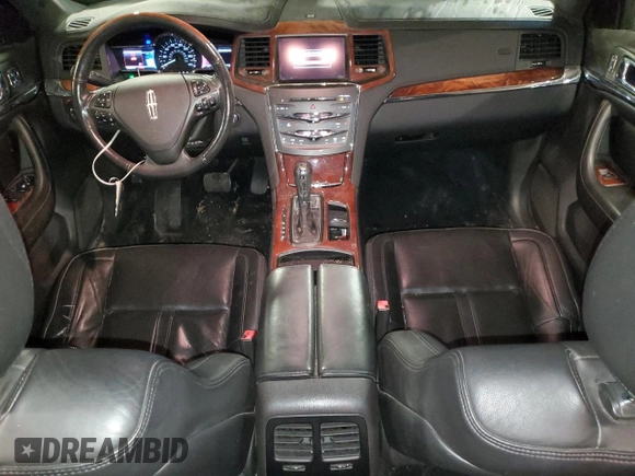 2013 Lincoln MKS with VIN 1LNHL9DK6DG606079, listed as a Copart auction lot 87322174 with 133,383 mi miles and Salvage Title. Bid and sale history available at DreamBid. Image 8.