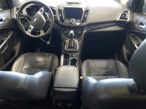 2013 Ford Escape Titanium z VIN 1FMCU9J90DUA98718, wystawiony jako Copart lot #63683005 z przebiegiem 101 036 mil mil oraz Czysty tytuł • Clean title. Historia ofert i sprzedaży dostępna na DreamBid. Obrazek 8.