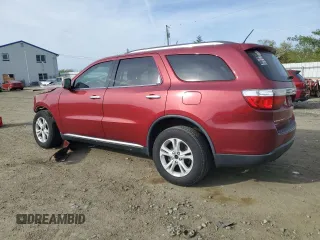 2013 Dodge Durango Crew with VIN 1C4RDJDG5DC686517, listed as a Copart auction lot 54696275 with Not provided miles and Salvage title. Bid and sale history available at DreamBid. Image 2.