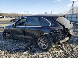 2016 Porsche Cayenne with VIN WP1AA2A21GKA38072, listed as a Copart auction lot 43082985 with 0 mi miles and Salvage Title. Bid and sale history available at carsss.com. Image 2.