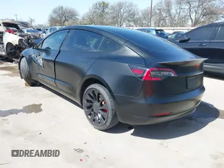 2022 Tesla Model 3 Performance with VIN 5YJ3E1EC6NF104475, listed as a IAAI auction lot 41734724 with 31,717 mi miles and . Bid and sale history available at carsss.com. Image 3.