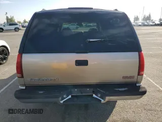 1999 GMC Suburban with VIN 3GKEC16R0XG526194, listed as a Copart auction lot 83740634 with 199,583 mi miles and Clean title. Bid and sale history available at DreamBid. Image 6.