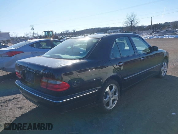 2002 Mercedes-Benz E-Class with VIN WDBJF82JX2X072422, listed as a IAAI auction lot 41390957 with 132,825 mi miles. Bid and sale history available at carsss.com. Image 4.