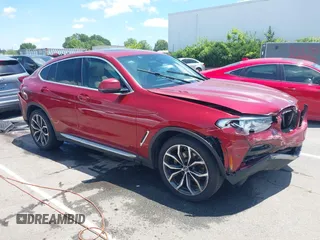 2021 BMW X4 xDrive30i z VIN 5UX2V1C07M9F59530, wystawiony jako IAAI lot #42484957 z przebiegiem Nie podano mil oraz . Historia ofert i sprzedaży dostępna na DreamBid. Obrazek 1.