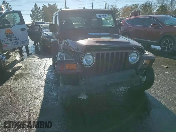 2001 Jeep Wrangler Sahara with VIN 1J4FA59S41P301365, listed as a Copart auction lot 87701675 with 134,081 mi miles and Salvage Title. Bid and sale history available at carsss.com. Image 11.