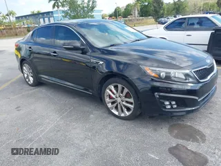 2014 Kia Optima SXL Turbo with VIN 5XXGR4A69EG348934, listed as a IAAI auction lot 42322630 with 119,171 mi miles and . Bid and sale history available at DreamBid. Image 1.