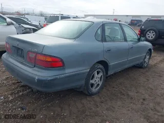 1999 Toyota Avalon XL with VIN 4T1BF18B9XU293219, listed as a IAAI auction lot 41467472 with NaN miles. Bid and sale history available at carsss.com. Image 4.