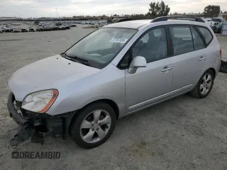 2009 Kia Rondo LX Base with VIN KNAFG528097222268, listed as a Copart auction lot 77797124 with 184,569 mi miles and Salvage Title. Bid and sale history available at carsss.com. Image 1.