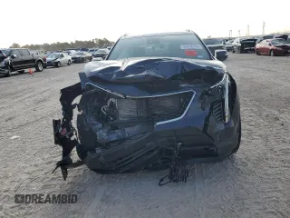 2022 Cadillac XT4 FWD Sport z VIN 1GYFZER45NF156035, wystawiony jako Copart lot #65836294 z przebiegiem 62 443 mil mil oraz Szkoda całkowita • Salvage title. Historia ofert i sprzedaży dostępna na DreamBid. Obrazek 5.