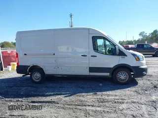 2023 Ford Transit Cargo with VIN 1FTBR2C8XPKA33372, listed as a IAAI auction lot 41735299 with 56,777 mi miles and . Bid and sale history available at DreamBid. Image 13.