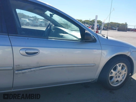 2003 Dodge Neon SXT with VIN 1B3ES56C43D215636, listed as a IAAI auction lot 40627629 with 121,237 mi miles. Bid and sale history available at carsss.com. Image 6.