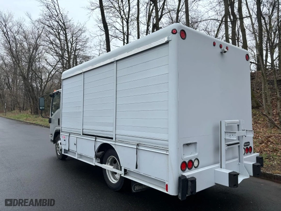 2019 Isuzu NRR DSL REG AT IBT PWL with VIN JALE5W167K7301631, listed as a Copart auction lot 52779745 with 100,482 mi miles and Clean Title. Bid and sale history available at carsss.com. Image 3.