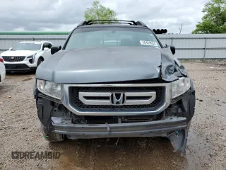 2011 Honda Ridgeline RTL with VIN 5FPYK1F52BB009042, listed as a Copart auction lot 69439004 with 119,889 mi miles and Salvage Title. Bid and sale history available at carsss.com. Image 5.