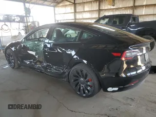 2021 Tesla Model 3 Performance with VIN 5YJ3E1EC0MF060360, listed as a Copart auction lot 43315195 with 28,726 mi miles and Salvage Title. Bid and sale history available at DreamBid. Image 2.