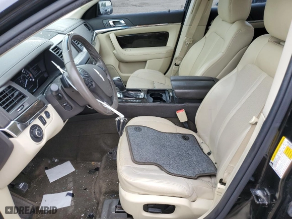 2015 Lincoln MKS with VIN 1LNHL9EK0FG608170, listed as a Copart auction lot 66771024 with 99,040 mi miles and Salvage Title. Bid and sale history available at carsss.com. Image 7.
