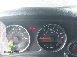 2012 Jeep Wrangler Sport z VIN 1C4AJWAG2CL286680, wystawiony jako IAAI lot #42434411 z przebiegiem 97 142 mil mil oraz . Historia ofert i sprzedaży dostępna na DreamBid. Obrazek 7.