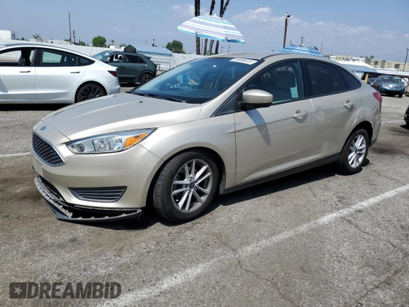 2018 Ford Focus SE z VIN 1FADP3F23JL303948, wystawiony jako Copart lot #55698915 z przebiegiem 85 500 mil mil oraz Szkoda całkowita • Salvage title. Historia ofert i sprzedaży dostępna na DreamBid. Obrazek 1.