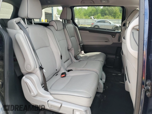 2022 Honda Odyssey Elite z VIN 5FNRL6H94NB051949, wystawiony jako Copart lot #53684245 z przebiegiem Nie podano mil oraz Szkoda całkowita • Salvage title. Historia ofert i sprzedaży dostępna na DreamBid. Obrazek 11.