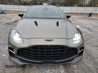 2023 Aston Martin DBX 707 z VIN SD7VUJBW5PTV06160, wystawiony jako Copart lot #76512973 z przebiegiem Nie podano mil oraz . Historia ofert i sprzedaży dostępna na DreamBid. Obrazek 5.