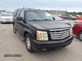 2003 Cadillac Escalade z VIN 1GYEC63T43R206146, wystawiony jako IAAI lot #41335727 z przebiegiem Nie podano mil oraz . Historia ofert i sprzedaży dostępna na DreamBid. Obrazek 1.