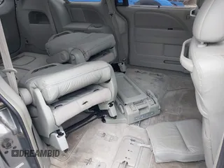 2005 Honda Odyssey EX-L z VIN 5FNRL386X5B038143, wystawiony jako IAAI lot #42149398 z przebiegiem 243 002 mil mil oraz . Historia ofert i sprzedaży dostępna na DreamBid. Obrazek 8.