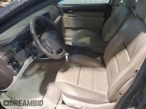 2000 Cadillac Catera z VIN W06VR54R7YR124650, wystawiony jako Copart lot #49602314 z przebiegiem 77 800 mil mil oraz Nie do naprawy • Non repairable. Historia ofert i sprzedaży dostępna na DreamBid. Obrazek 7.