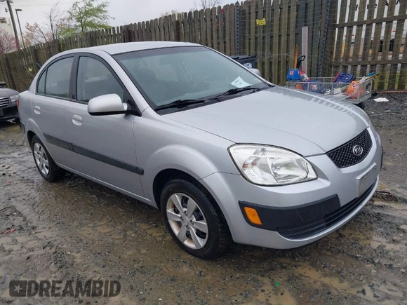 2009 Kia Rio SX with VIN KNADE223596538965, listed as a IAAI auction lot 42029409 with 143,794 mi miles. Bid and sale history available at carsss.com. Image 1.