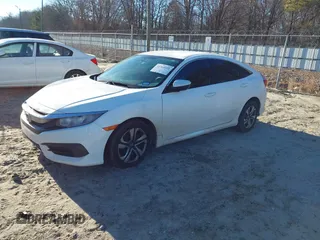 2017 Honda Civic LX z VIN 19XFC2F50HE007646, wystawiony jako IAAI lot #41360121 z przebiegiem 133 800 mil mil oraz . Historia ofert i sprzedaży dostępna na DreamBid. Obrazek 17.