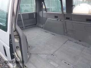 1992 Dodge Caravan Grand SE z VIN 1B4GH44R5NX258694, wystawiony jako IAAI lot #42197603 z przebiegiem 152 591 mil mil oraz . Historia ofert i sprzedaży dostępna na DreamBid. Obrazek 8.