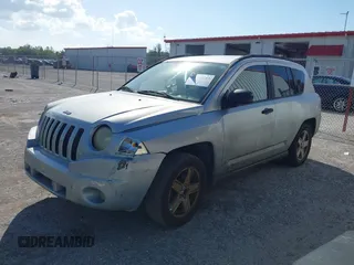 2007 Jeep Compass Sport with VIN 1J8FT47W57D185807, listed as a IAAI auction lot 41700283 with 194,339 mi miles. Bid and sale history available at carsss.com. Image 17.