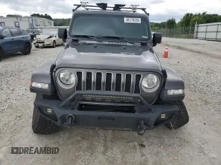2018 Jeep Wrangler Unlimited Sahara с VIN 1C4HJXEG0JW308332, выставлен на аукционе Copart как лот 58778355 с пробегом 90 384 миль миль и Списание • Salvage title. История ставок и продаж доступна на DreamBid. Изображение 5.